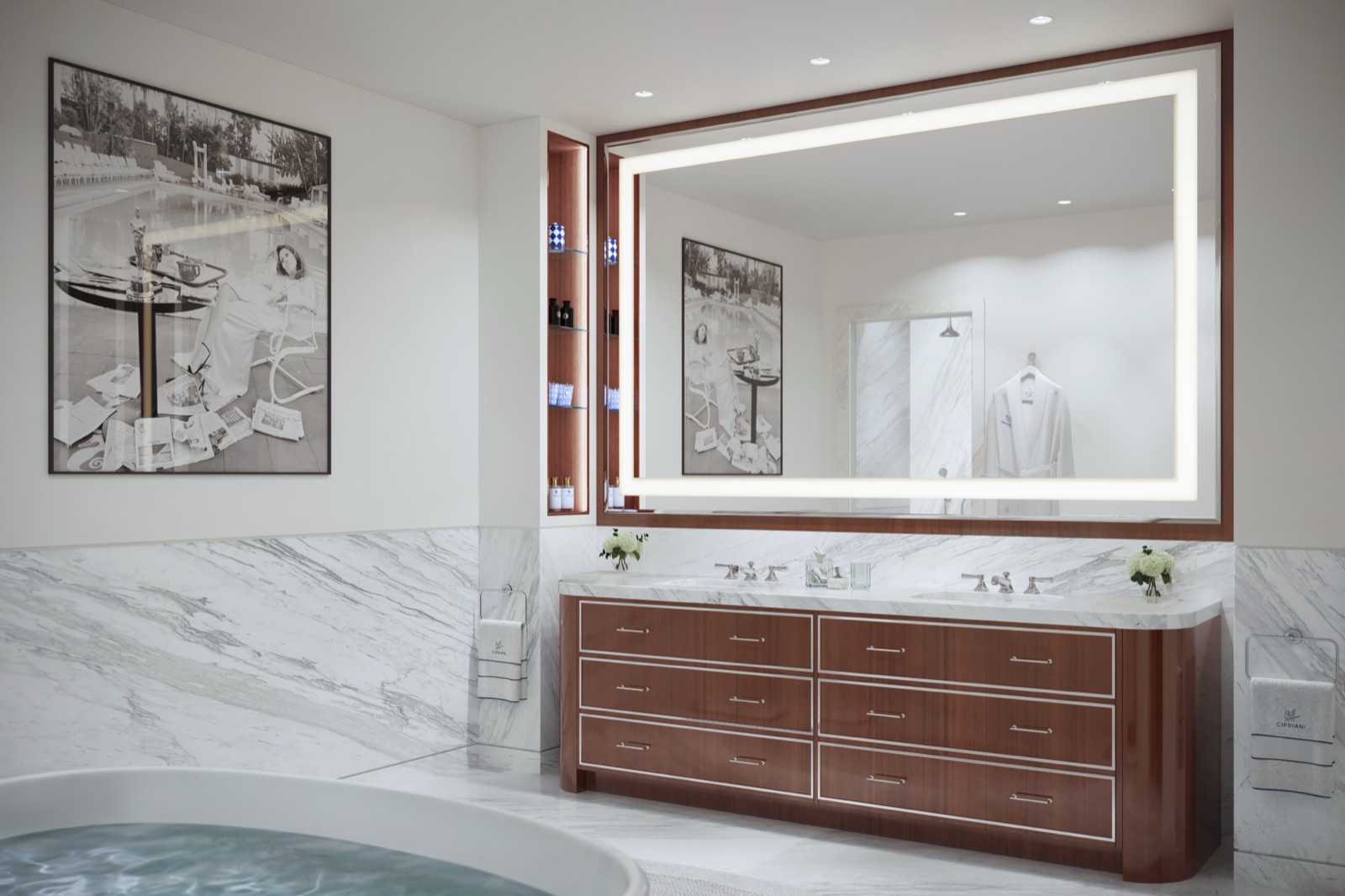 Primary bathroom with grand stand-alone bathtub, glass-enclosed shower, imported Italian cabinetry, imported stone tops, and back-lit mirrors.